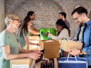 charity workers sorting donated clothes